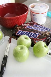 Snickers Salad....a potluck pleaser! 8 oz chream cheese softened, 1 C powdered sugar, 12 oz Cool Whip, 6 snicker bars, 4-6 Granny Smith apples.