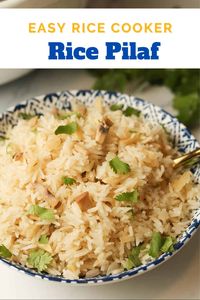 This rice cooker pilaf rice recipe guarantees the most flavorful rice pilaf! With the convenience of a rice cooker, it's perfect for hands off and easy cooking. It's made with wholesome and savory ingredients, like chicken broth, mushrooms, garlic and crunchy almonds. It's perfect for busy weeknights! Get the recipe on www.apeachyplate.com