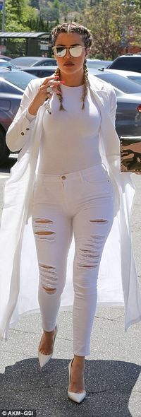 Khloe Kardashian wears a in tight white outfit as she films KUWTK with Scott Disick