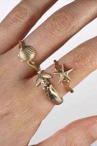 Sea Shell, Starfish and Mermaid Rings in 18k gold.