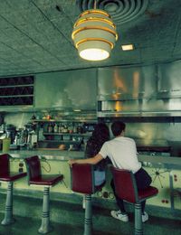 Cinematic, florida , diner, notes, vintage cute, cowgirl, Jupiter cozy, movie scenes, couples inspo, aesthetic, couples photos, in love, young, free, movie stills, cinematography, documentary style photography, storytelling, colorado photographer, couples photos, florida photographer, diner , 70s