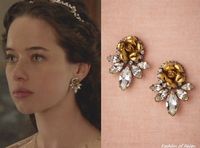 In the seventeenth episode Lola wears these Elizabeth Cole Wild Rose Earrings