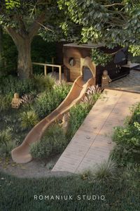 The wooden house with a slide has been integrated into the natural slope between two trees. Behind the house, we designed a mud kitchen and a sandbox. Overall, we aim to design playgrounds in a way that doesn't impose a specific way of use on children. It's best when kids come up with their own games.