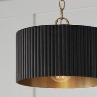 Artisan texture meets mid-century modern style in the Donovan Dual Mount Semi-Flush or Pendant. The Black Stain fluted mango wood shade evokes a natural elegance, while the Matte Brass interior adds a warm glow.Collection: Donovan