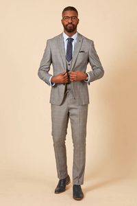 MARC DARCY Jerry Two Piece Suit - Grey Check The Marc Darcy Jerry grey check two piece suit. This blazer offers a modern take on a classic Prince of Wales check and is double lined with a subtle check running through it and royal blue colour pop lining. Whether it's for a wedding, a day at the races, a prom or to liven up your work wardrobe, the Jerry will have you turning heads. The Length Of This Suit Is Regular As Standard, If Your Looking For Short Or Long Fittings This Suit Can Easily Be Ad