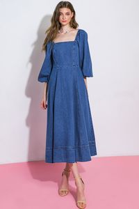 A washed denim midi dress featuring square neckline, long sleeve, fitted bodice, full skirt and back zipper closure This charming FEELIN'S GROOVY DENIM MIDI DRESS offers a fresh, timeless take on denim style. Crafted from washed denim fabric for a unique, luxe feel, it features a flattering square neckline, long sleeves, fitted bodice, full skirt and back zipper closure for a hint of sophistication. Elevate your wardrobe with this effortlessly chic ensemble. Details Self : 85% Cotton 15% Polyest