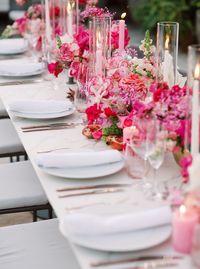 This Ibiza wedding inspiration is chock full of bright fuchsia florals, and it is most definitely a MOOD. Visions of textured flower garlands and petal pink candles will forever be dancing in our heads! If you are dreaming of a Mediterranean style wedding yourself, you will not want to miss this vibrant scene!