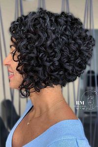 A short stacked bob with bouncy curls gives your hair a lively and modern look. Curious to see more photos? Tap here to feast your eyes on more short curly stacked bobs. Photo Credit: Instagram @rmcachos