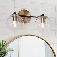 This exquisite dual globe wall light adds a touch of elegance and sophistication to your home decor. Each spherical lampshade is made of bubble glass. This fixture not only illuminates your space but also adds a vintage charm.