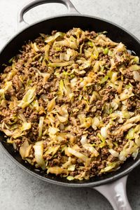 This easy ground beef and cabbage stir fry is the best weeknight dinner! It's low-carb (but delicious served over rice or noodles), simple, and fairly healthy.