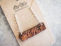 Personalized monogrammed hand tooled leather bar necklace. This necklace is on a 16 adjustable antique bronze chain. The leather bar is 1.75w and 0.6 tall. **Send me a photo of your brand or note your initials in the order notes. This necklace can fit 1-3 initials.** Option for a turquoise or