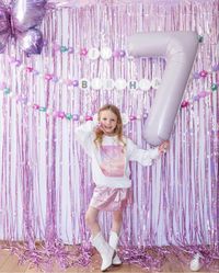 In my birthday era backdrop + outfit Friendship bracelet garland, Taylor swift party, little girls Taylor Swift birthday party  Follow my shop @mrsggcast on the @shop.LTK app to shop this post and get my exclusive app-only content!  #liketkit #LTKkids #LTKparties @shop.ltk https://liketk.it/4CgMv