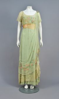 JEANNE HALLEE PAINT DECORATED GOWN, EARLY 20th CMint green silk having an overlay of mint chiffon painted with pink and green...