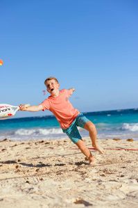 Big Southern Tide fans might find a new favorite in this bold kids’ graphic t-shirt featuring gradient blue stacked branding against a sunset-colored background. Style: 6884