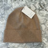 Elevate Your Winter Wardrobe With This Chic Tan Beanie From A New Day, Perfect For Adding A Touch Of Warmth And Style To Your Cold-Weather Ensembles. Key Features: New With Tags: This Beanie Is Brand New With Tags, Ensuring Its Quality And Authenticity, Ready To Be A Stylish Addition To Your Wardrobe. Versatile Design: The Timeless Tan Color Makes This Beanie Easy To Pair With A Variety Of Outfits, Offering Endless Styling Options For Both Casual And Dressy Looks. Comfortable Fit: Crafted From H