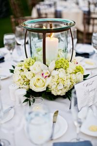 Classic white floral and candle centerpiece - Photo by Jennifer Bowen Photography | via junebugweddings.com