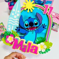 "Beautiful cake topper to decorate your cake and personalize it with the theme Lilo and Stitch Dimensions  Cake topper: 6\"x10.5\" aprox You can follow us on Instagram @aliro.byange and see more of our party supplies! There are no returns, refunds or exchanges. Shipping: The order will be shipped on the confirmed date, but I am not responsible for the order after the item has been shipped. If the item is lost or delayed, all inquiries and complaints should be directed to the US Postal Service, who is responsible for shipping and delivering your order once it has been delivered. Unfortunately, I did not issue a refund due to the USPS not delivering on time."