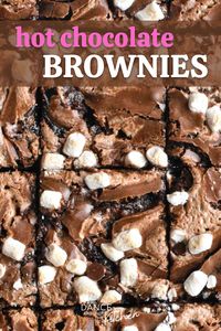 These easy Hot Chocolate Brownies are fudgy, have a swirl of hot cocoa marshmallow cream and are topped with marshmallow bits! They're super pretty and simple, thanks to a box of brownie mix! #HotChocolate #Brownies #BrownieMix