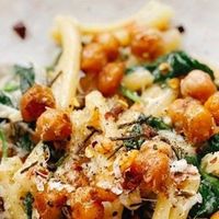 NYT Cooking on Instagram: "Put that can of garbanzos to use with @alexaweibel's Creamy Chickpea Pasta With Spinach and Rosemary, one of our most beloved weeknight recipes. Recipe link in bio. (Photo: @thehappyfig)"