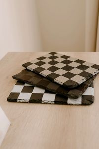 This checkered slate coaster is right on trend! If you like to have two drinks nearby or have a significant other you like to cuddle up to, this double coaster is meant for you. Choose from our white, black, beige, or even a custom color to fit your aesthetic.  Please read the full description before placing your order. Thank you!  Approximate dimensions: 8.75" x 6" The natural chiseled edge and top texture will slightly vary on each piece.  This listing is for 1 slate coaster when you select yo