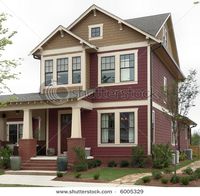 Craftsman style - distinctive widening columns; simple, squared lines, multi-paned windows.