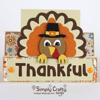 Use the Thankful Turkey Card SVG File for a Thanksgiving greeting card. Finished card is 5.5” x 4.25” and fits into an A2 envelope. If you do not have any A2 envelopes, make one with the FREE Basic Envelope Set. Card can be cut using (1) 8.5" x 11" cardstock sheet or larger. Smaller paper can be used for the elements.    Products Used:   	American Crafts (AC) Textured Cardstock 12 x 12 inch  	Art Glitter Glue  	Fine Tip Glue Bottle Applicator (for Art Glitter glue) https://amzn.to/2wG4khV  	Scot