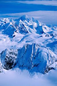 Alaskan landscape of the snow-covered Fairweather Mountains. Glacier Bay National Park, Alaska.<br />