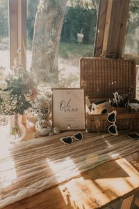 Wedding guest book with polaroid pictures and camera for guests | wedding guest book ideas | photograph wedding guest book | wedding accessories and sunglasses | Pink Wave Photography