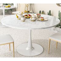 Elevate your dining space with the Recaceik white faux marble round tulip dining Table, adding a sleek, modern feel to your home. This versatile kitchen table features a minimalist design that's perfect for a variety of settings, such as a breakfast table, coffee table, living room table, casual coffee table or outdoor dining table. Small round table size: 42.1"L * 42.1"W * 28.74"H Brand: Recaceik ColorWhite Style: Modern Mid-Century The faux marble round dining table is made of high-quality MDF