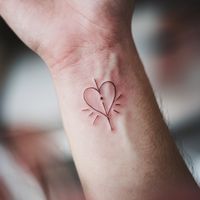 If you’re someone who finds inspiration in words, small dainty script tattoos are a great way to carry meaningful quotes or phrases with you. The delicate curves of script work beautifully with small tattoo designs, especially on areas like the wrist, collarbone, or side of the finger.