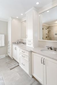 No more cluttered sinks! Custom cabinets allow for clients to tweek their space to better suite their needs. master bathroom | bathroom | ideas | custom | cabinets | organization #ashmorebuilders