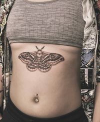 Moth tattoo. Sternum tattoo