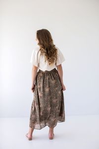 Introducing the 'Evangeline' midi skirt – a floral dream come true! This midi skirt is adorned is beautiful and delicate florals and has some really fun styling potential. Pair with a light sweater and low ankle boots for a comfortable and flowy ensemble for a brunch with friends or a day at the office! 100% Polyester Shell & Lining Fully Lined Hand Wash Cold Wash Inside Out Hang or Lay Flat to Dry Do Not Bleach Do Not Dry Clean Iron Low Heat If Needed Model Height 5'8" | Wearing Size 2X Model H