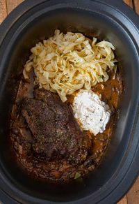 Slow Cooker Pot Roast Beef Stroganoff is tender, shredded chuck roast, creamy sour cream mushroom sauce and egg noodles. #stroganoff #beefstroganoff #potroast #chuckroast #shreddedbeef #dinner #dinnerthendessert