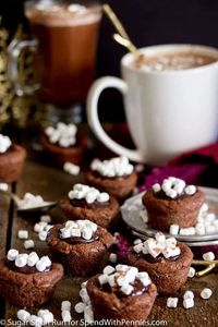 Hot Chocolate Brownie Cups -- fudgy, easy-to-make brownie cups filled with a rich chocolate ganache and topped with mini marshmallows.  These adorable brownie bites are reminiscent of sweet little cups of hot chocolate!