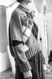 True to the spirit of the Alexander McQueen Spring/Summer 2018 pre-collection, this oversized Argyle jumper draws upon the concept of heirlooms: a young woman taking treasured paste pieces from her grandmother’s jewellery box and densely hand-embroidering them onto her father’s cherished sweater. Photographed in the atelier.