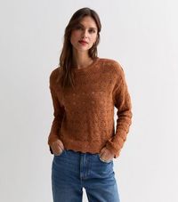 New Look Rust Stitch Knit Crew Neck Jumper. Refresh your knitwear for this season and next with this rustjumper.Made from a patterned stitch fabric, layer it over a cami or plain tee for an effortless fit.- Rust- Crew neckline- Long sleeves- Pointed scallop trim- Ribbed collar, cuffs and hem- Patterned stitch knit fabric- Model is 5'9"/175cm and wears size S