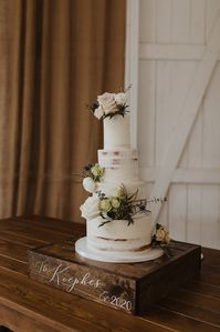 Wanderlynn Photography | Boxed and Burlap | Wisconsin Wedding | southeast wi wedding venue | outdoor wedding | wedding cake | cake floral | wedding cake flowers | cake decor | summer wedding | lake geneva wedding | chicago wedding | floral design | Milwaukee wedding florist | floral designer | event florist | wedding trends 2021 | bridal bouquet | bride and groom | cute couple | wedding photography | wedding portrait | wedding dress | wedding inspiration | blush and white wedding | covid wedding