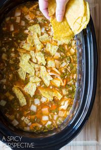 Slow Cooker Chicken Tortilla Soup Recipe - This fresh and zesty chicken tortilla soup is easily made in the slow cooker, perfect for setting and forgetting until dinnertime. Then, it's completely unforgettable! #chickentortillasoup #slowcookerchickentortillasoup #slowcookerrecipes #tortillasoup #aspicyperspective