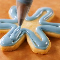 Decorating sugar cookies is even more satisfying than eating them. Get the recipe at Delish.com. #recipe #easy #easyrecipes #delish #sugar #cookies #baking #decorating #holiday #christmas #howto #icing #christmasrecipes #holidayrecipes #bakinghacks