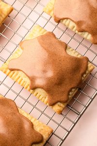 Create the most amazing Homemade Brown Sugar and Cinnamon Pop Tarts with a simple pop tart pastry dough filled with rich buttery brown sugar, expertly baked, and finished with a heavenly cinnamon frosting!