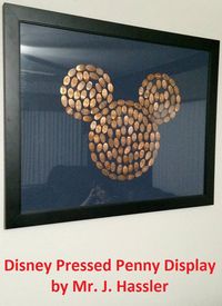 This Disney Pressed Penny display was created by Mr. J. Hassler - The trick is to go to a coin dealer and buy rolls of pennies from before '82 when they were still all copper.... they press the best. This one is about 200 pennies. Just use a strong craft clue to hold them in place on a piece of colored foam core. This frame is 22"x28"