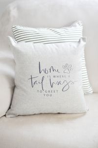 "Home is where a tail wags to greet you." Inspired by our sweet husky pup who has made our house the sweetest place to come home to. Nothing is better than a dog's love! This linen pillowcover is 18x18 inches and features a design with dark charcoal lettering. **This is a cover only!** A 20x20 pillow insert is recommended for a nice, full pillow that remains consistently fluffed. Four different colors of cases are available to select from: off-white, light pink, natural/tan, and light grey. Each