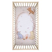 The breathable 100% cotton photo opportunity Classic Pooh fitted crib sheet is the perfect way to capture a memorable moment with your little one. Your baby will be surrounded by Pooh, Piglet, Eeyore, and Tigger along with the words Magical new beginnings. There is elastic all the way around ensuring a safe and secure fit on a standard-size crib mattress. This sheet will create a calming and inviting sleep space for your little one.