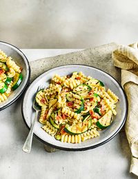 Salty smoked bacon adds extra flavour to this simple courgette pasta, livened up with fried chilli flakes for a quick midweek meal