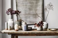 industrial dining table with handmade glazed vases from sheridan