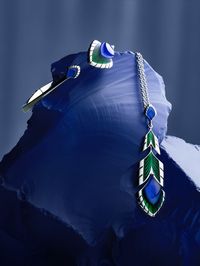 A journey to the edges of the cosmos, discovering unknown, luminescent worlds in Lalique's Paon jewellery collection.