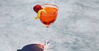 The Scarlet Spritz cocktail tweaks the classic Aperol Spritz with strawberry-infused Aperol, Lillet Blanc aperitif and a hint of absinthe.