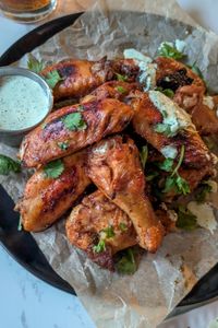 My baked Peruvian chicken wings with cilantro ranch are full of flavors and still come out crispy with no frying and oven-baking. #chickenwings #wings #chickenrecipes #spicychicken #appetizers