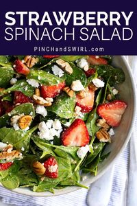 The BEST Strawberry Spinach Salad recipe with baby spinach, sweet strawberries, buttery pecans, and creamy goat cheese tossed in a honey sweetened balsamic vinaigrette. Perfect for a couple or for a crowd - so easy to make!